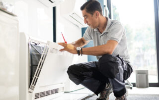 home inspector inspecting an air filter