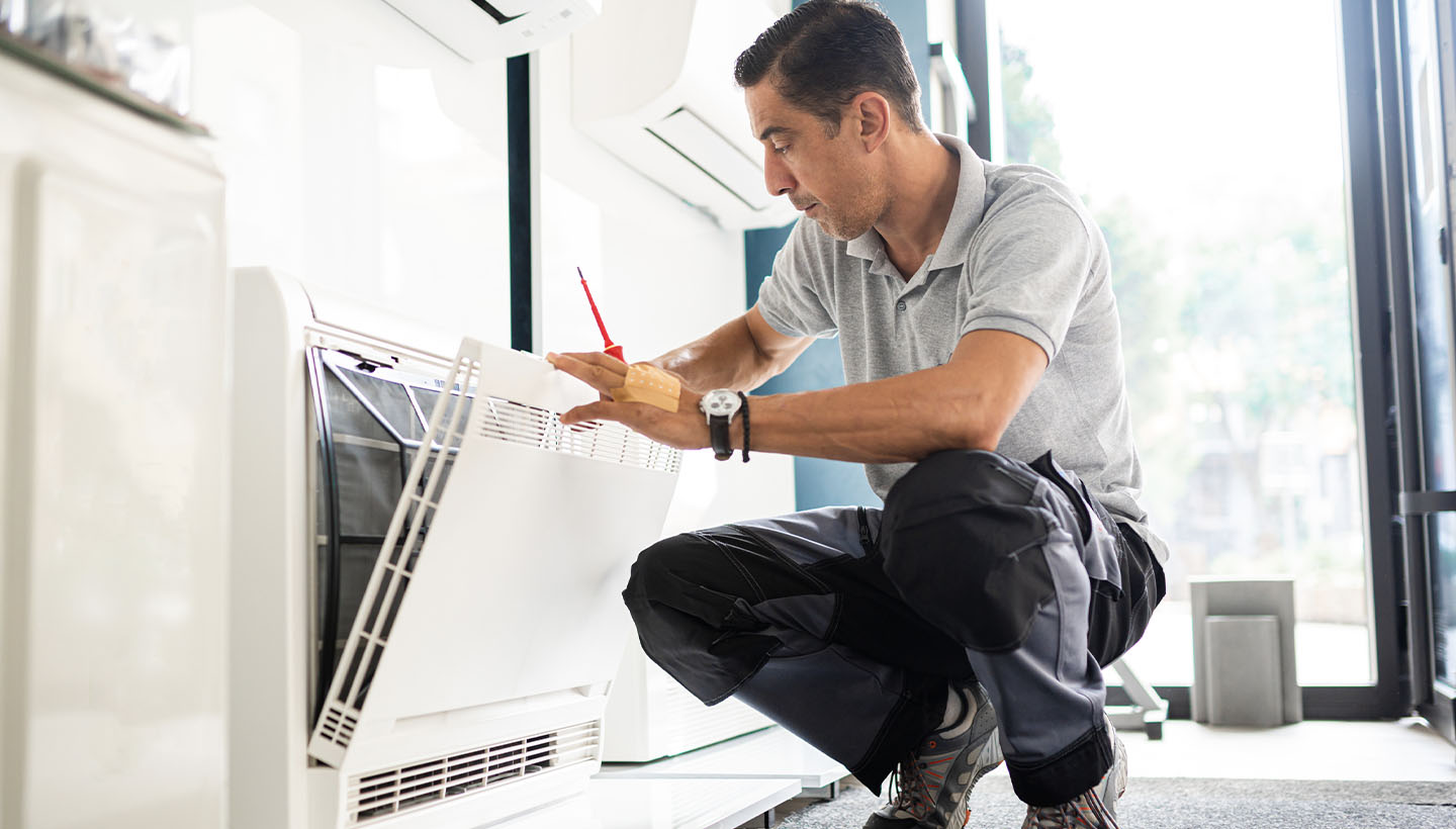 home inspector inspecting an air filter