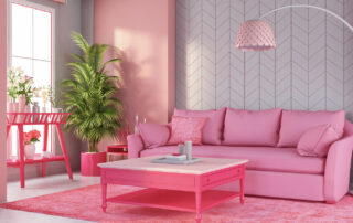 Picture from inspecting the Barbie Dreamhouse. A pink room with a pink sofa and table