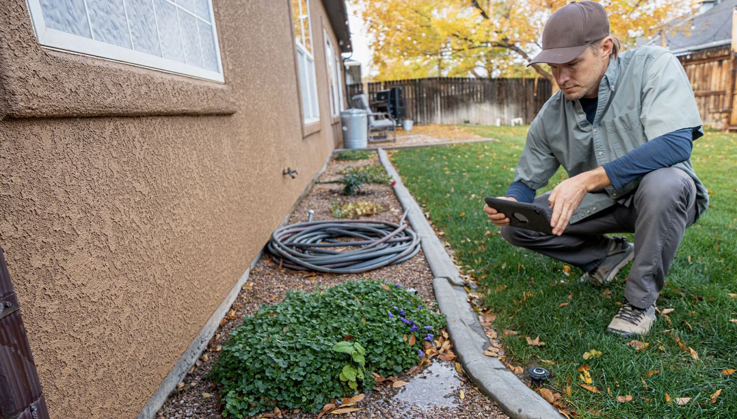 The cost of a foundation inspection depends on many factors. Here is an inspector taking a look.