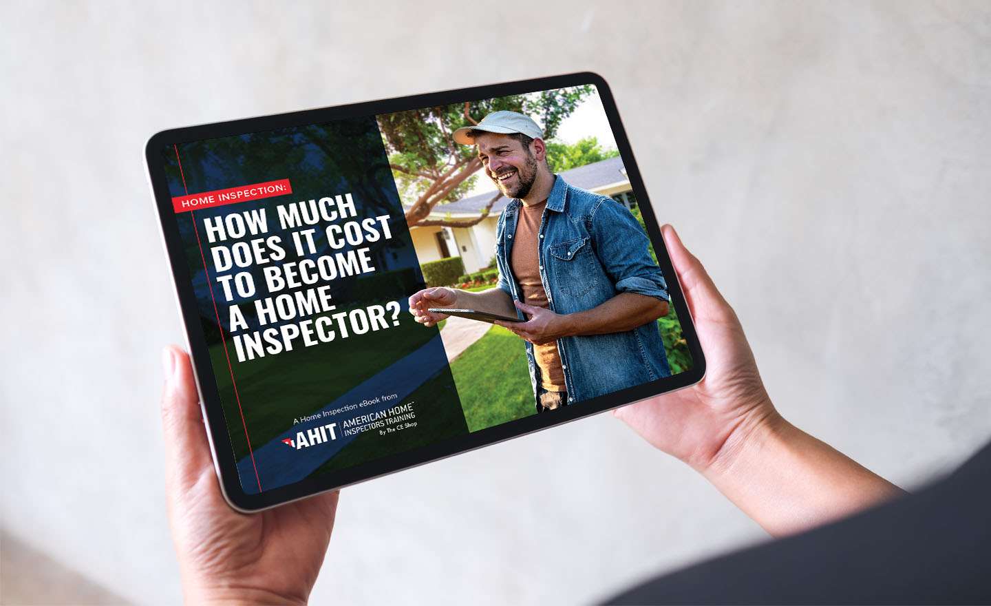 Black tablet displaying cover page of AHIT Ebook: How Much Does It Cost to Become a Home Inspector?