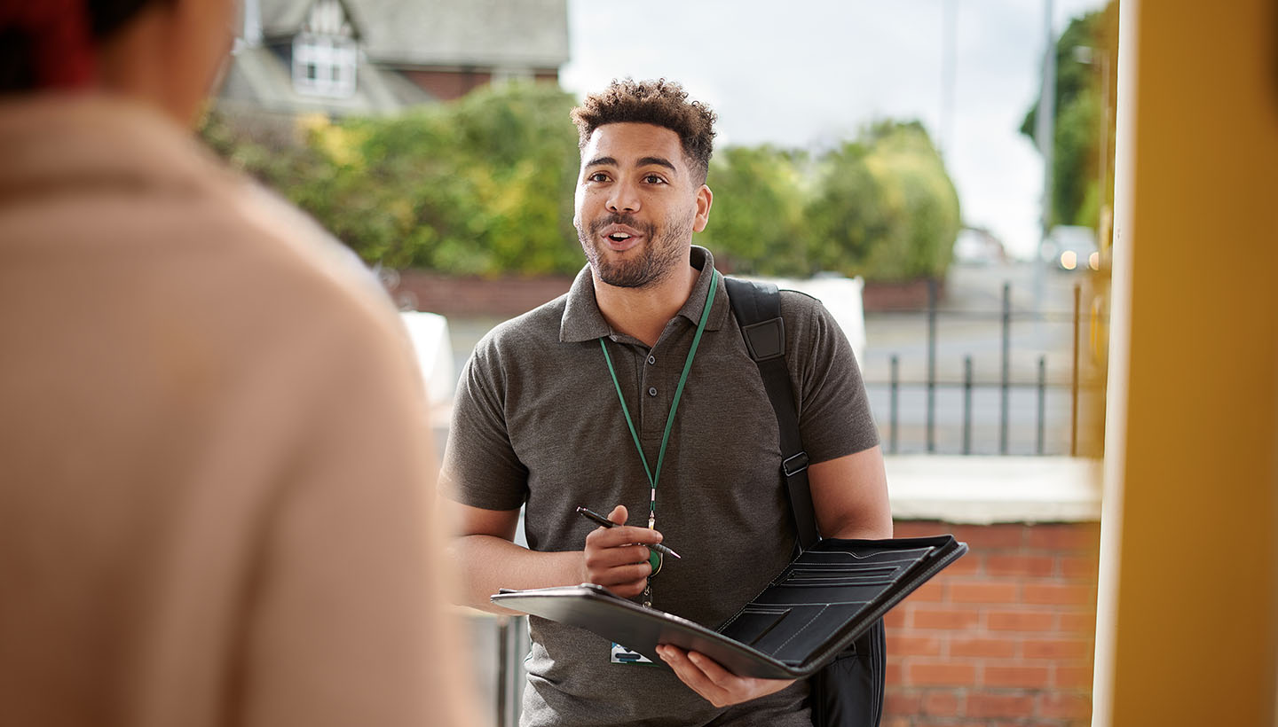 A new home inspector meeting a client at their front door