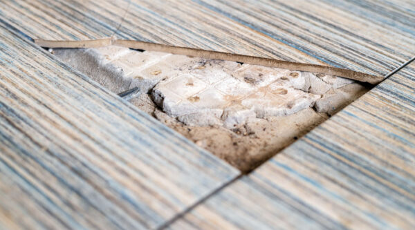 A picture of a broken asbestos tile. Yikes!